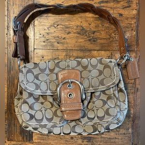 Coach canvas logo bag with snap closure